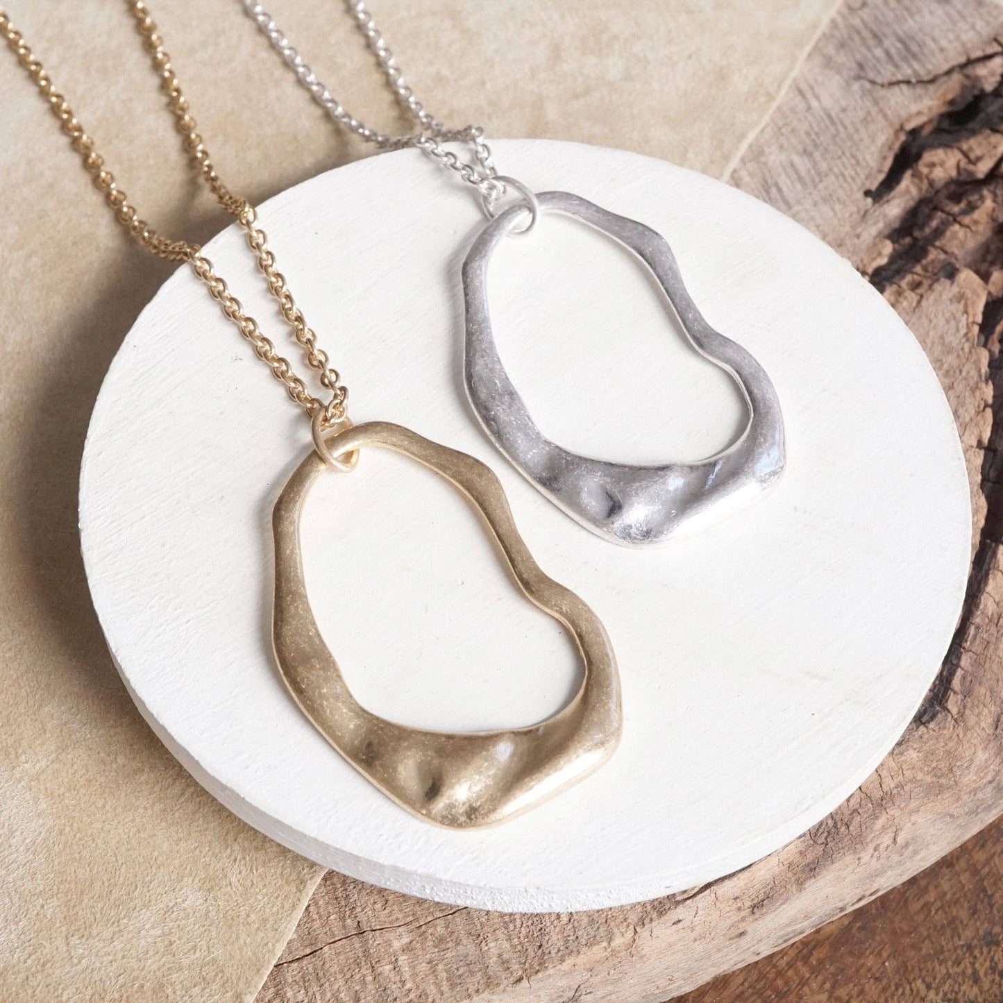 Minimalist Asymmetric Circle in Worn Gold