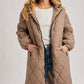 Norah Quilted Puffer Jacket in Black