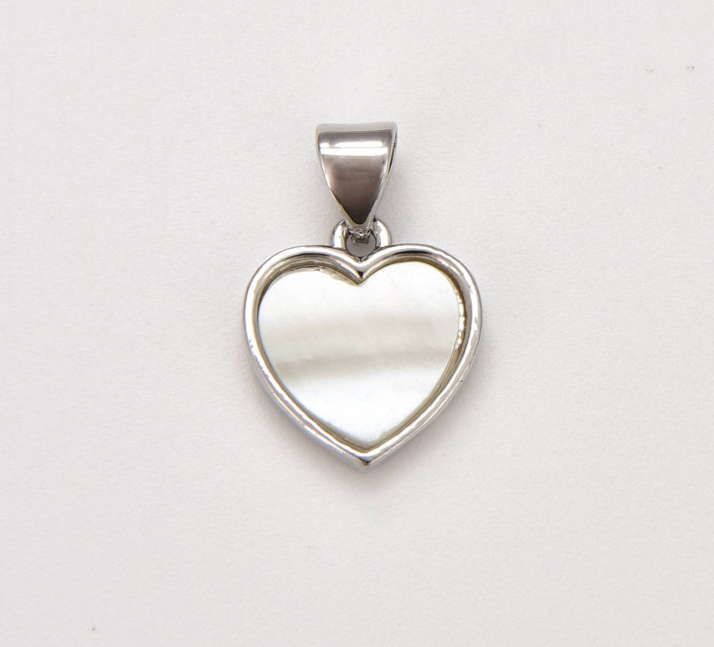 Mother Of Pearl Heart Charm Pendant In Silver