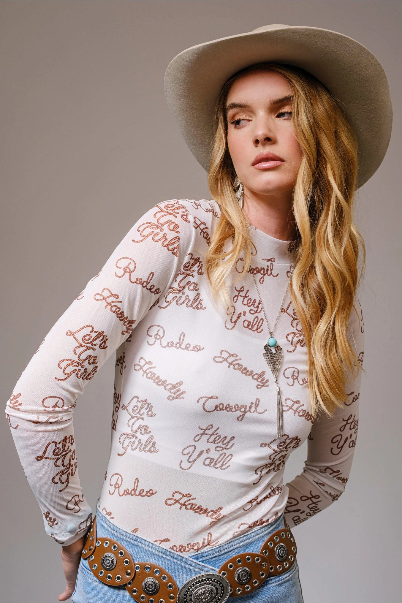 Kate Mesh Graphic Long Sleeve Mock Neck Top