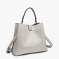 Tati Satchel in Cow Print