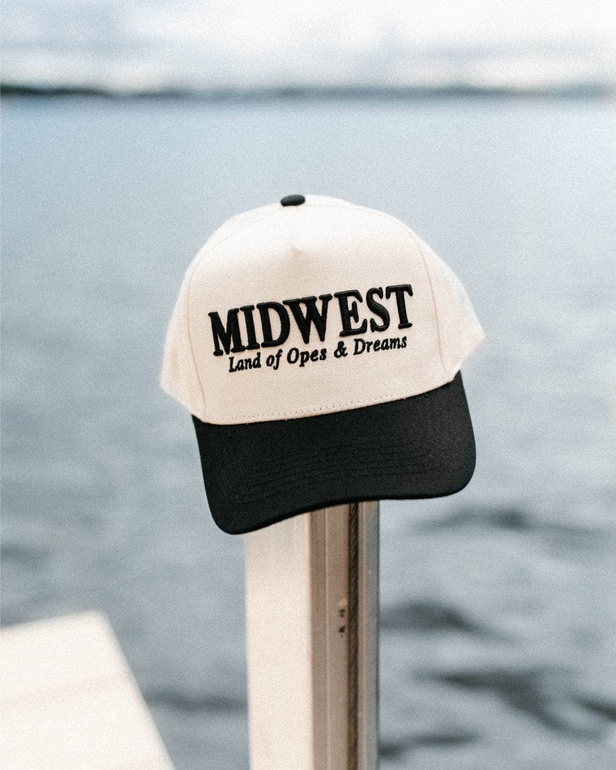 Midwest Land of Opes & Dreams Unisex Trucker Hat in Black & Cream