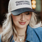 Drinks Well With Others Vintage Trucker Hat in Black and Tan