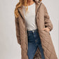 Norah Quilted Puffer Jacket in Black