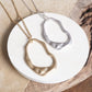 Minimalist Asymmetric Circle in Worn Gold