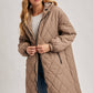Norah Quilted Puffer Jacket in Black