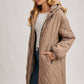 Norah Quilted Puffer Jacket in Black