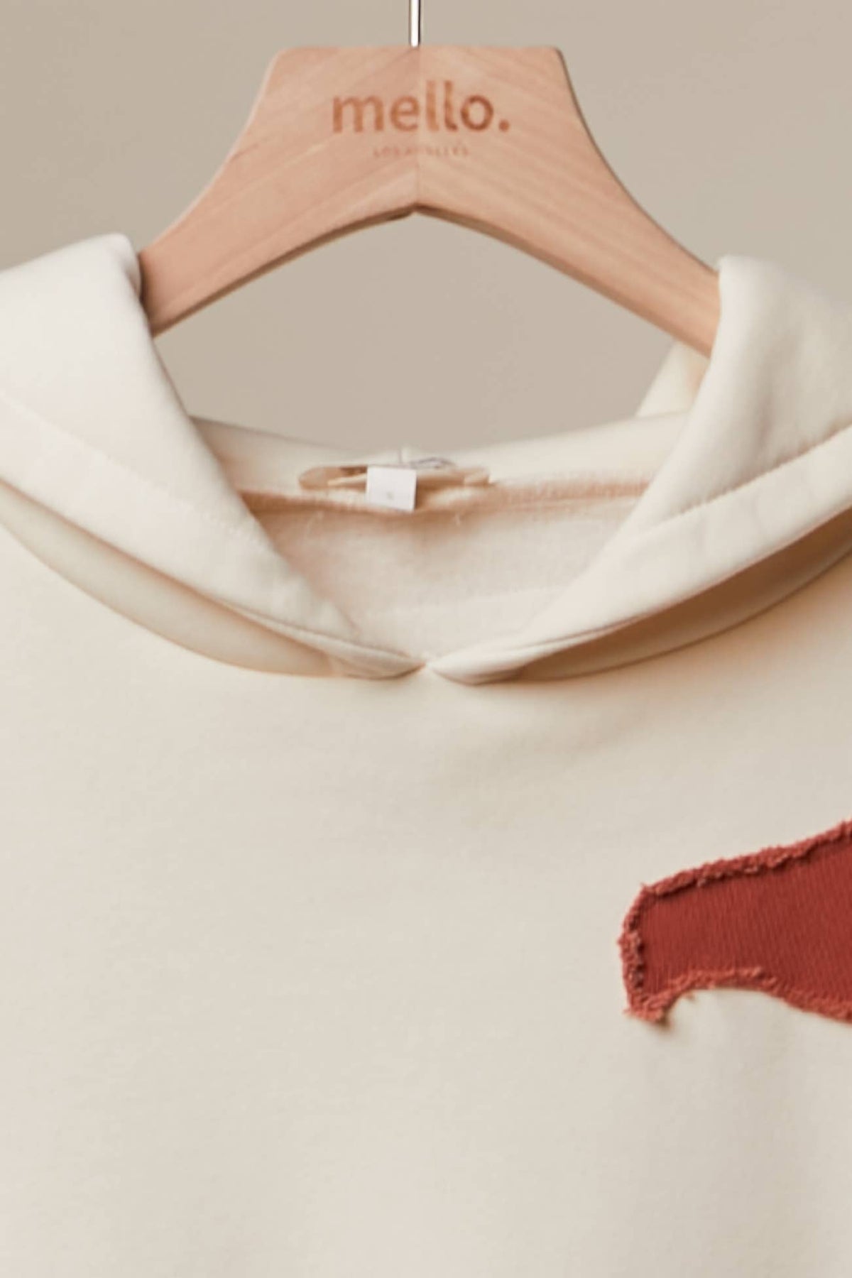 Alissa Abstract Patch Hoodie with Kangaroo Pocket in Cream